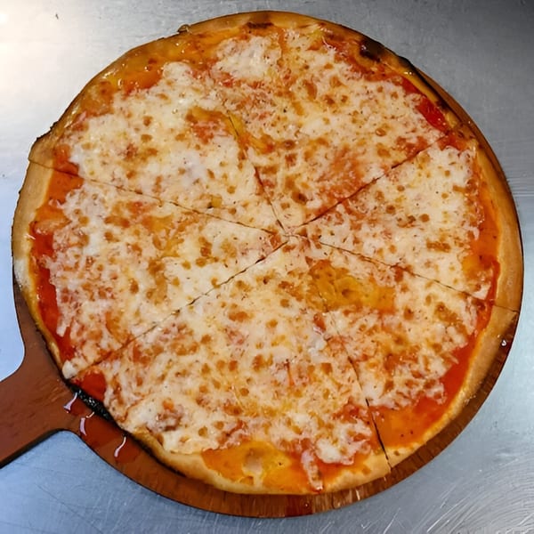 A whole Milans Pizza cheese pizza, cut into slices, on a wooden pizza peel.